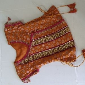 Girls Formal Silk Brocade Wrap Top with gold embroidery and side that lace down